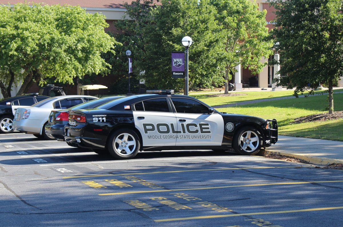 A police car in the parking lot of a Georgia university. Multiple police cars raced to the high school on the day of the shooting (Photo by Michael Rivera) 