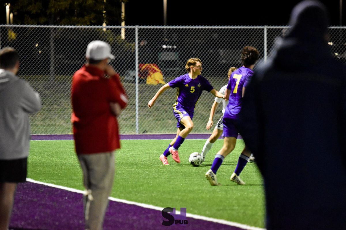 On Oct. 17, Ryan Rhoades, 11, looks to pass the ball to a teammate during a match against the Eudora Cardinals.