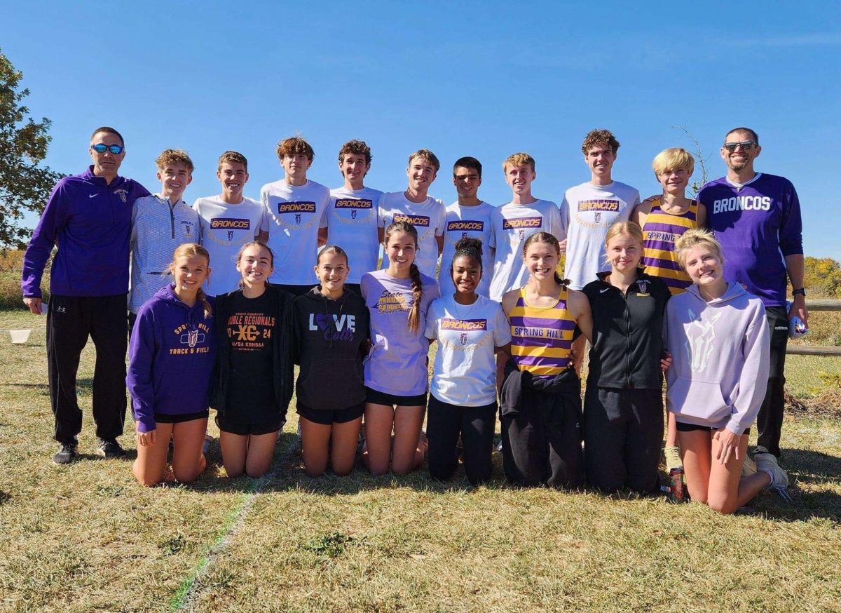 The girls and boys cross country teams pose for a photo together after the awards ceremony. This is the second consecutive year both teams have qualified for state. (Photo submitted by Logan Beckman)