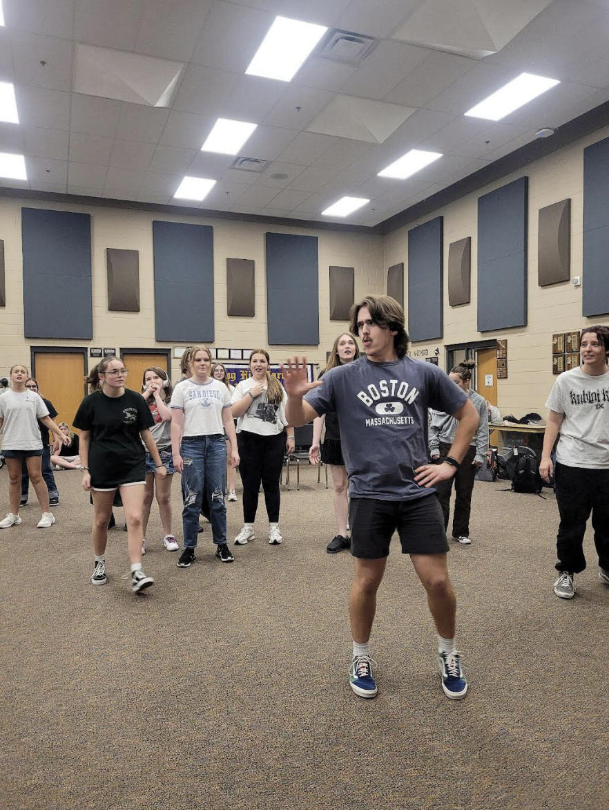 Zachary Vasser, 12, performs the classic song 'Gaston' during a dance rehearsal. Vasser is in the leading role of Gaston in this year's production of Beauty and the Beast. (Photo by R. Higgs)