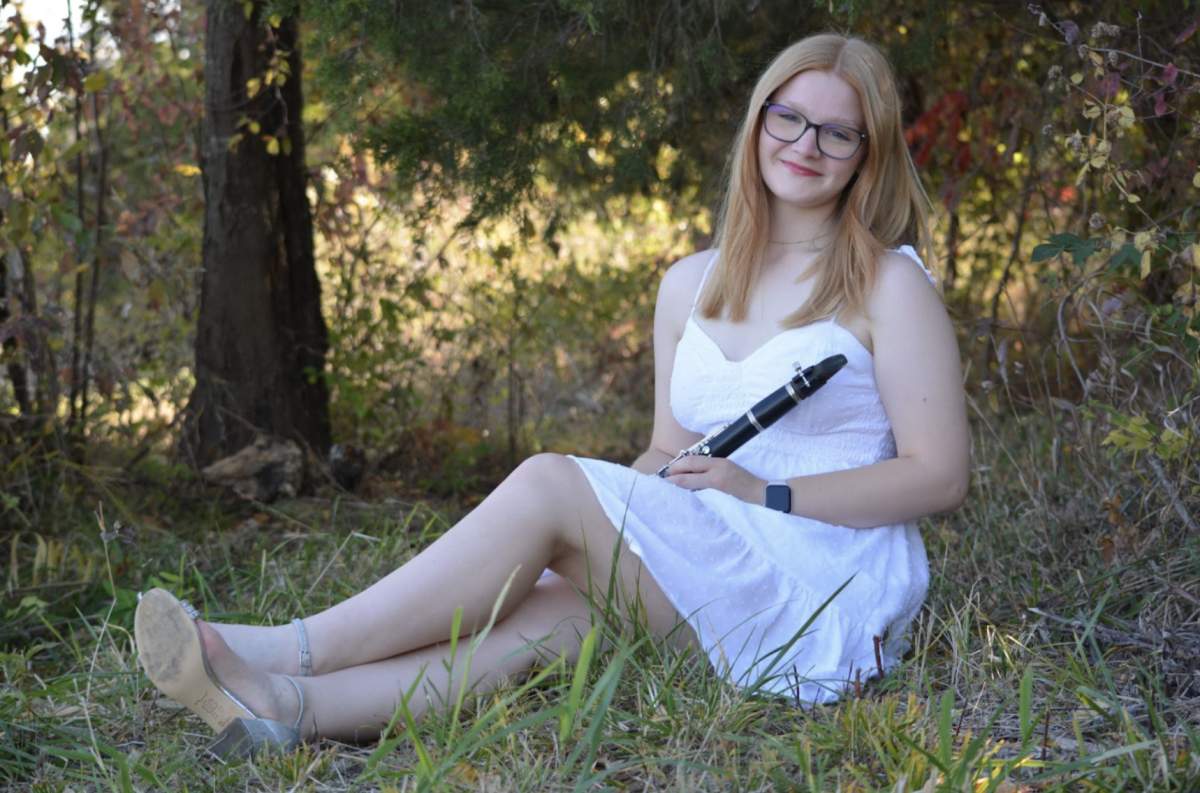 Olivia Tarvin, 12, poses with her clarinet. Tarvin has played the clarinet for eight years and has recently picked up the alto saxophone. (Photo by Z. Tarvin)