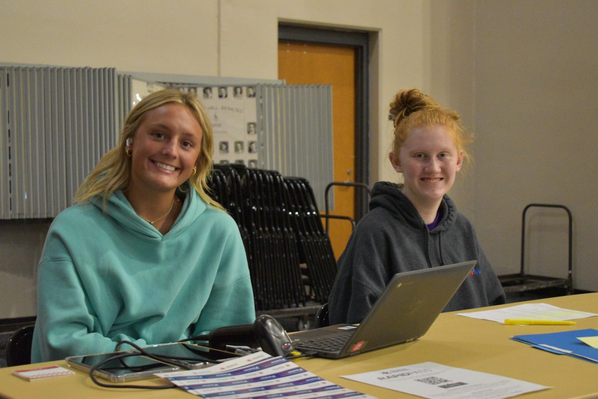 HOSA members Elizabeth Suter, 12, and Aiden Barentine, 10, volunteer at the blood drive. HOSA's goal was to have 40 units of blood donated. (Photo by K. Tran)