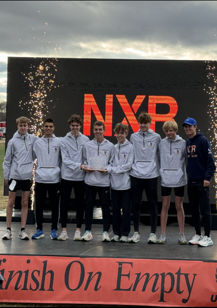 The boys cross country poses as winners at the NXR Heartland competition (Photo by S. Smitheran).