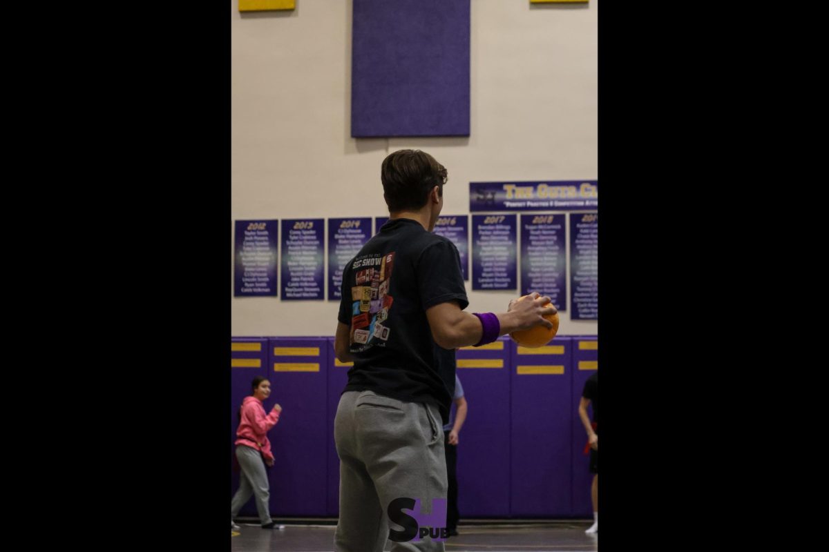 On Dec. 3, Benjamin Ragan, 11, prepares to throw a dodgeball during a game of crackabout.