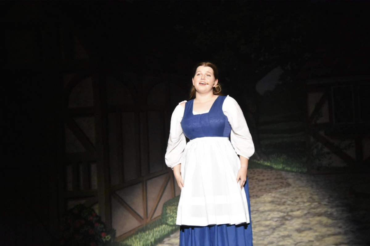 Maryanne McNally, 12, sings Belle (Reprise) during Act I of the production. McNally has participated in many theatre productions, and plans to continue acting and singing for their enjoyment. (Photo by D. Heinen)