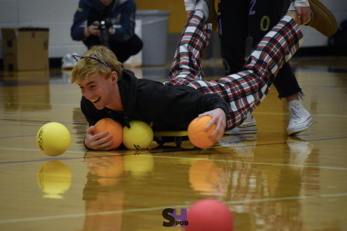 On Jan. 16, Miles Pankey, 12, competes in a game during the winter homecoming pep assembly with other coronation candidates.