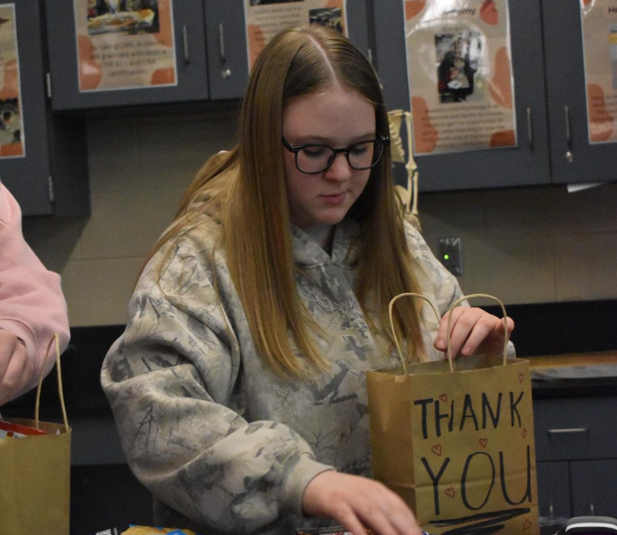 Hawkins gathers items and puts together a gift bag for nurses in our community. They shared that they have enjoyed this service project and hopes to continue it in the future. (Photo by K. Tran)