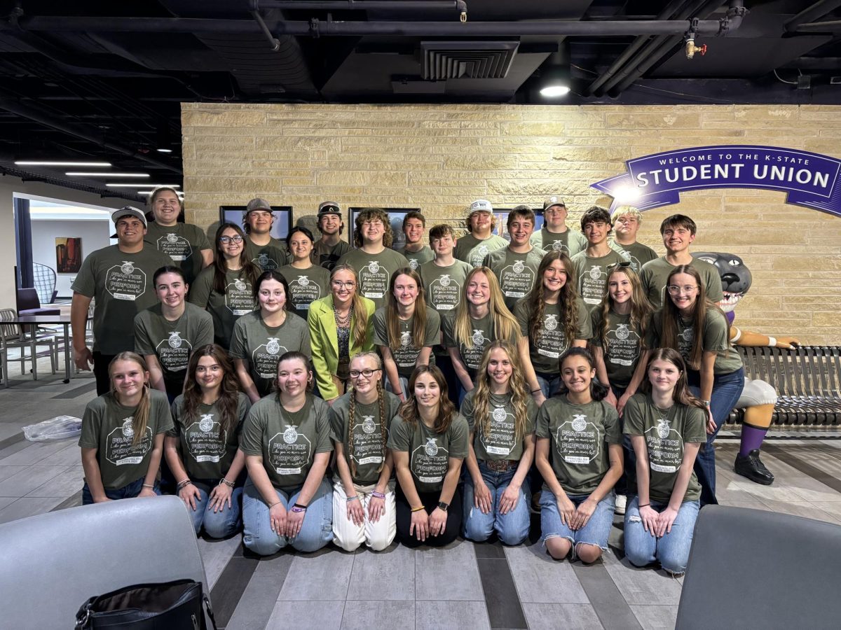 FFA students who went to state pose for a group picture. Two of the teams, dairy cattle and poultry judging qualified for nationals and they took this group picture before leaving. 