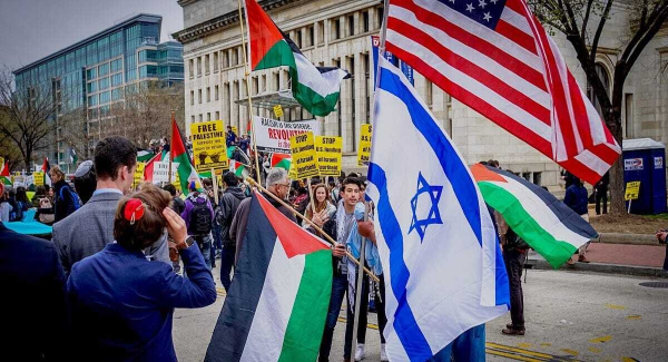 Americans protest U.S. funding of Israel. The war, though contained in the Middle East, affects people around the world.