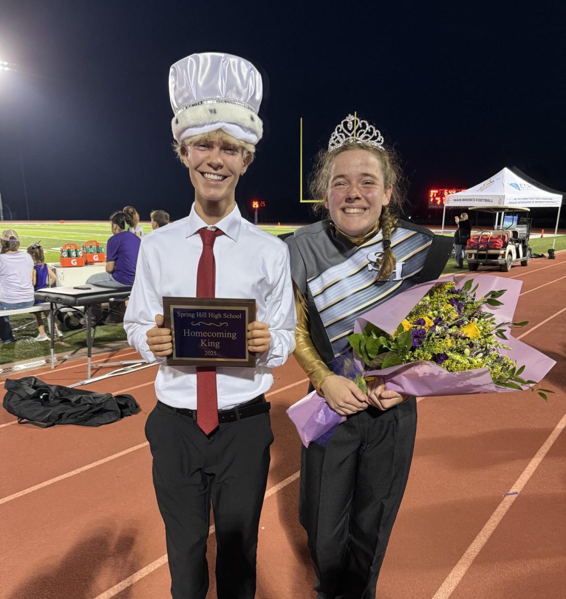 Kian O’Shea and Lily Meek, 12, capture the unforgettable memory after receiving their titles of homecoming king and queen. Both students want to thank the senior class for their support. 
