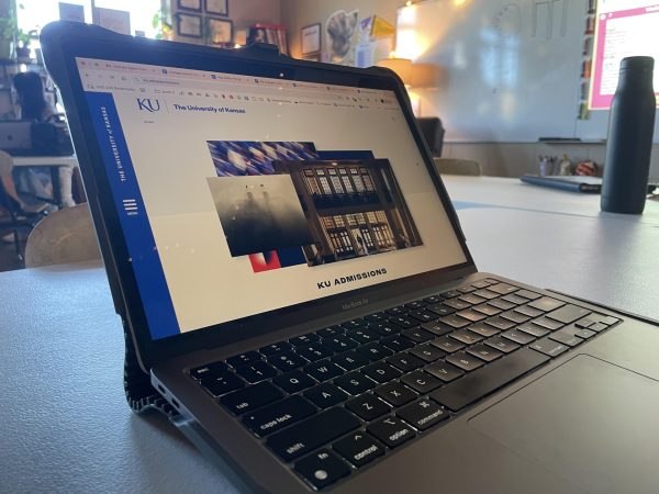 A student goes on the KU admissions page to apply for free.