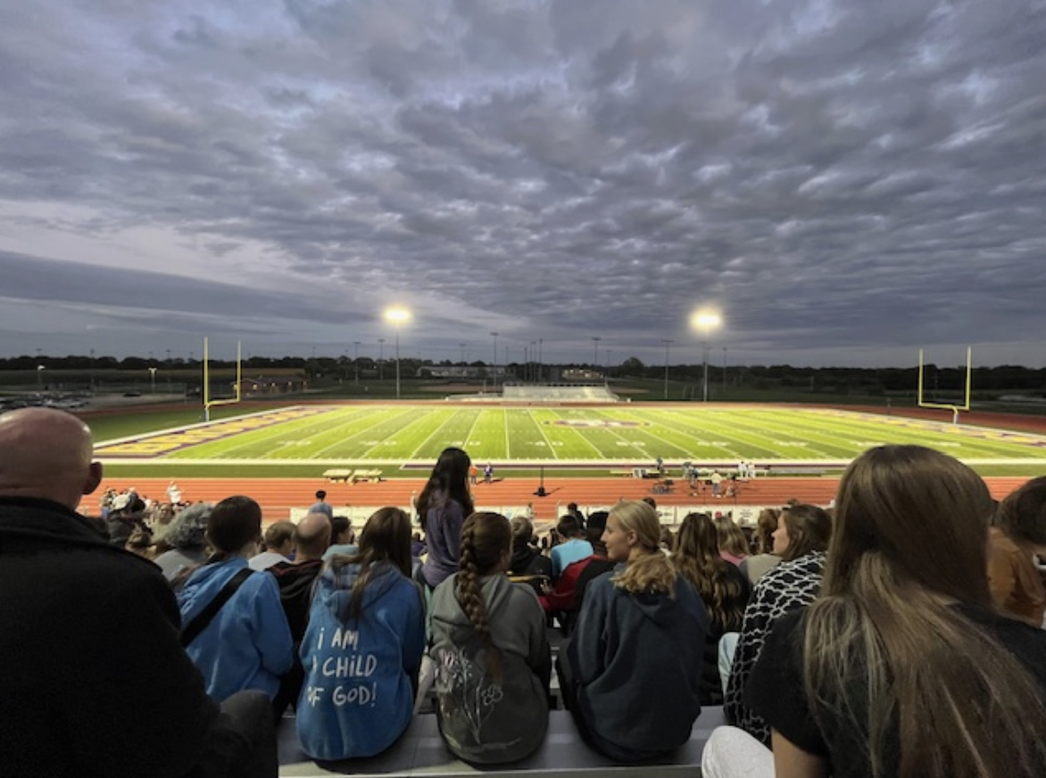 A group of students gathers together on the football field for fields of faith on October 8th. This group of students, joined by their beliefs, show a deep sense of unity.