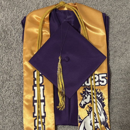 Pictured are the essentials to walking graduation. Early graduates are still encouraged to walk at the end-of-the-year graduation ceremony.
