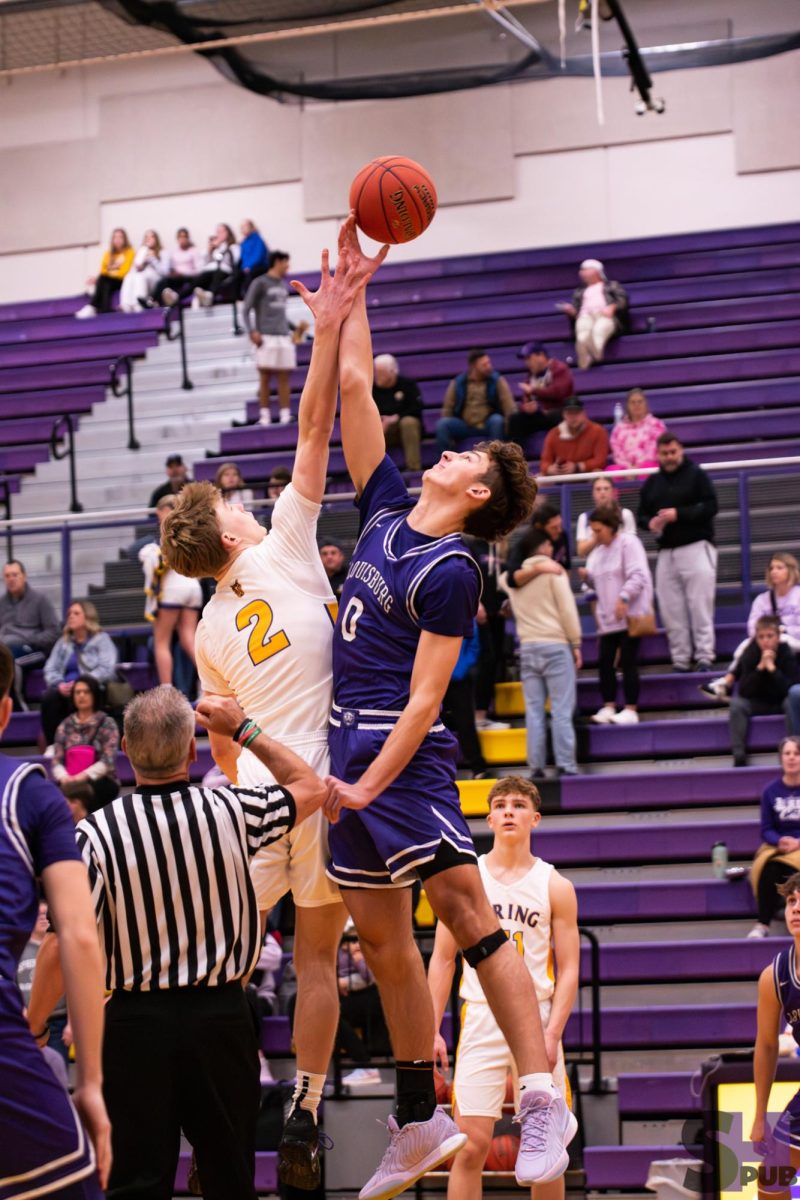 On Jan. 9, Jackson Bruce, 11, tries to get the ball from a Louisburg opponent. 