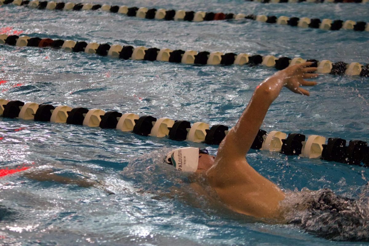 Samuel McMains, 10, starts the final lap of their event at a meet at Blue Valley Northwest on Jan. 27. They focused on stride showing the consistent training and dedication they put in throughout the season.