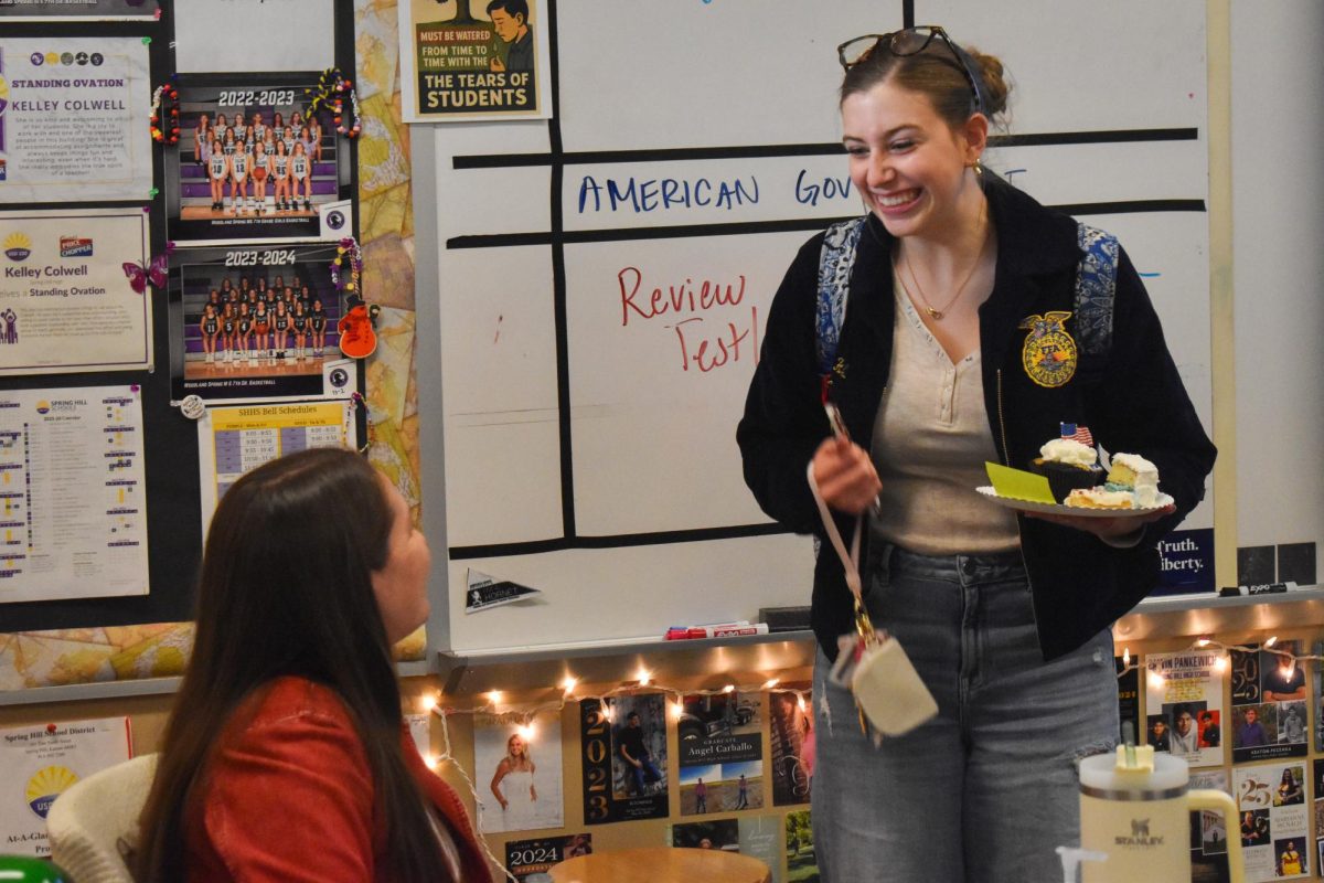On Jan. 28, Kailey Holwell, 12, tells Kelly Colwell, AP government teacher, exciting news.