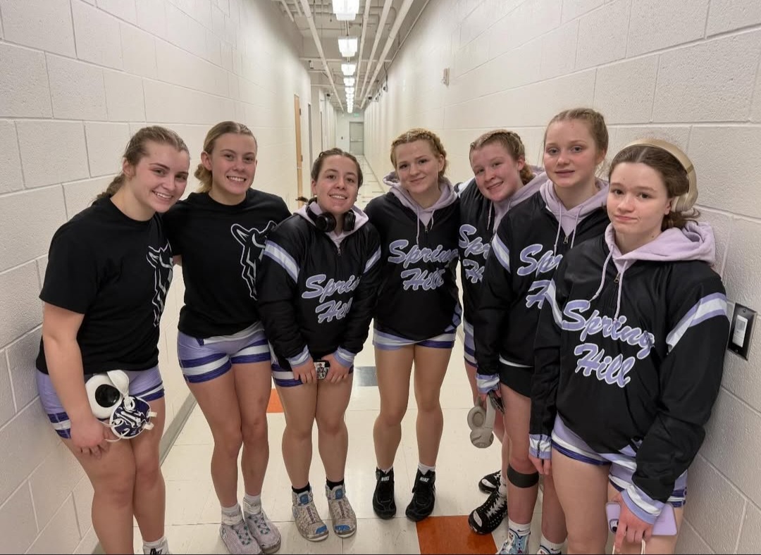 The state qualifiers for the girls team pose together after the regional meet. Several girls and boys qualified for state.