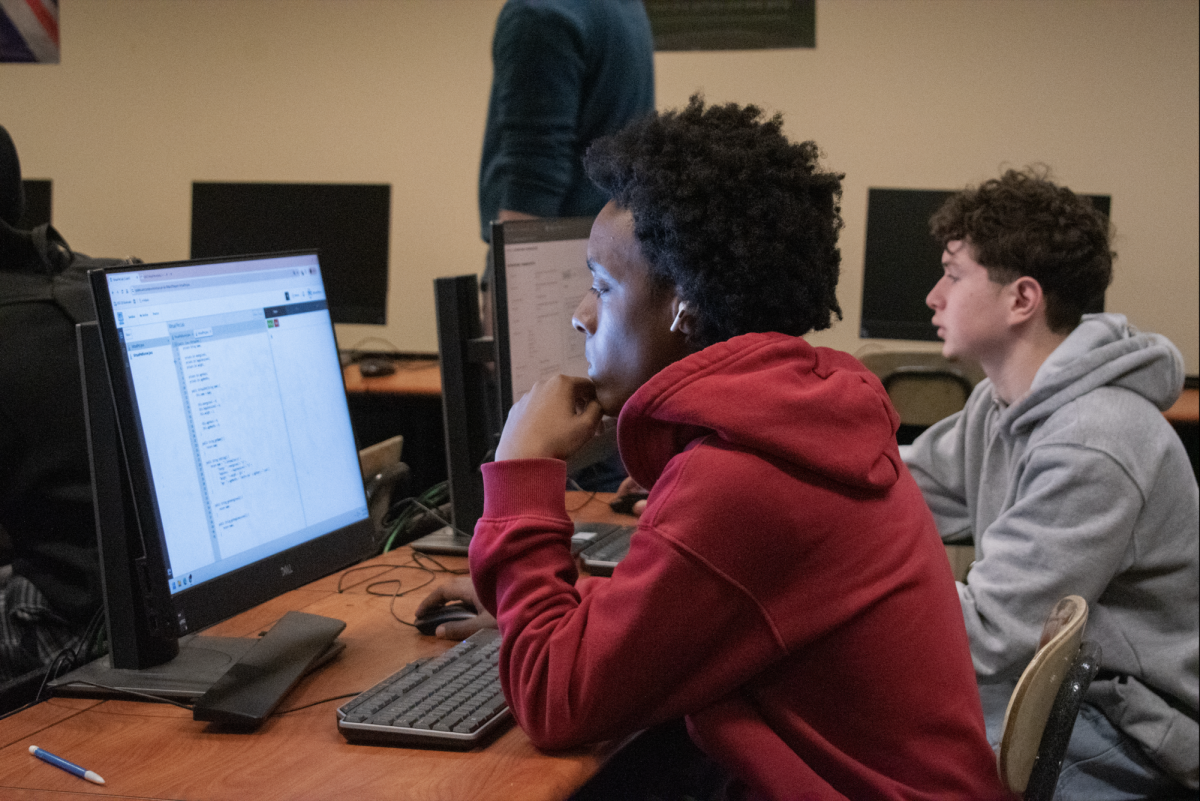 Hermon Worku, 12, works independently on their coding in AP computer science on Jan. 22.