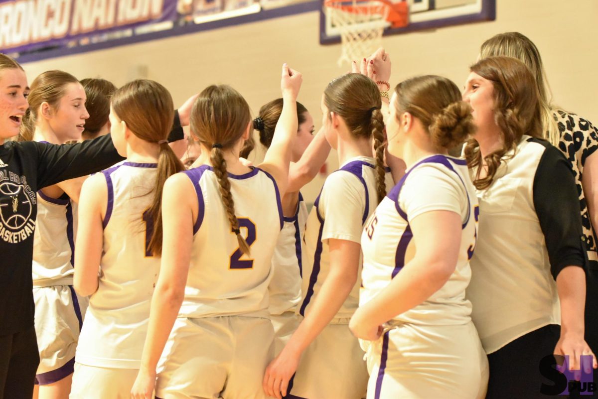 On March 4, the varsity girls basketball team have a breakdown before the last game of the season.