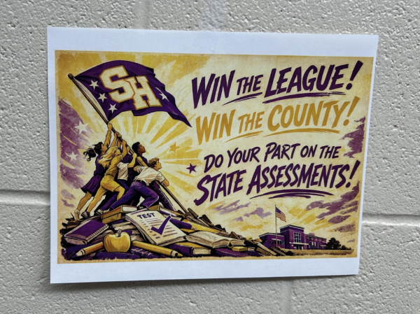 A propaganda-inspired AI poster displayed in the school hallway uses bold slogans and national symbols. These were used to motivate students during their state testing week.