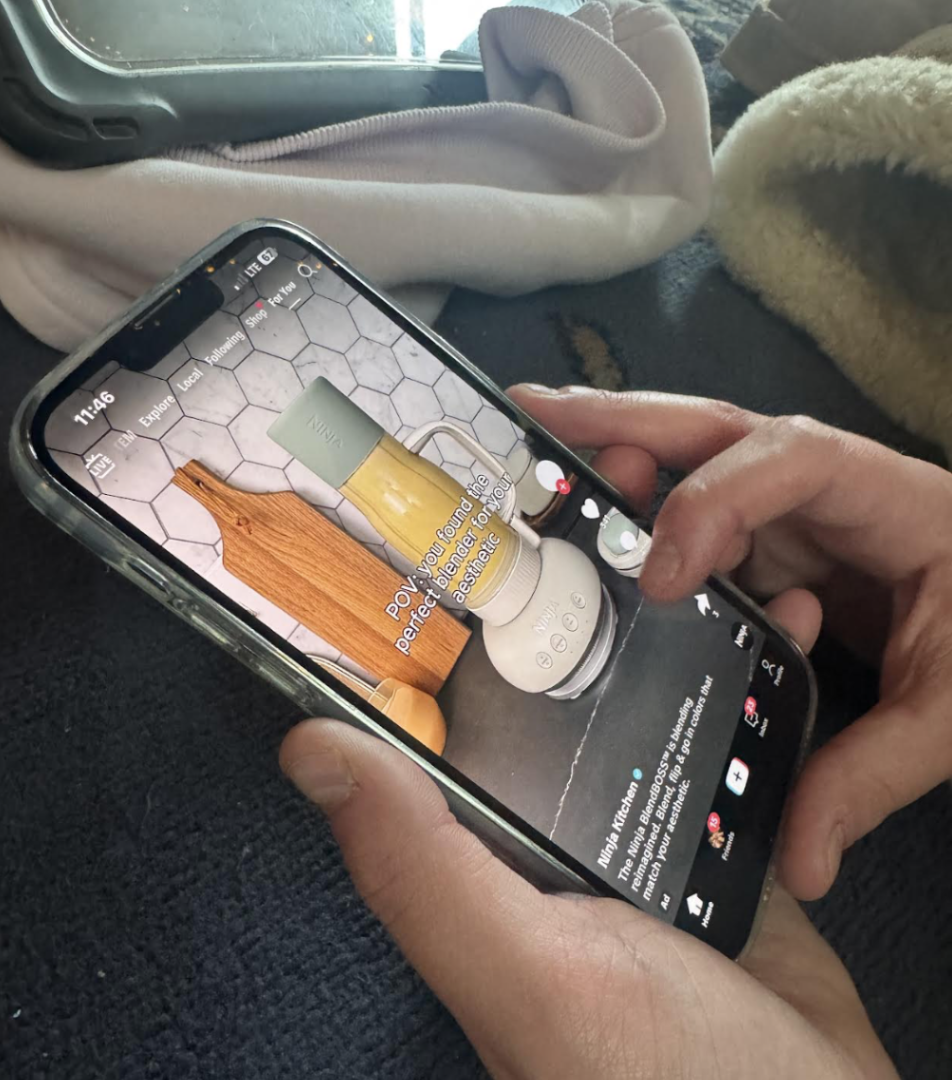 A student scrolls through TikTok, watching one video after another without stopping. Time passed quickly as the feed kept changing.
